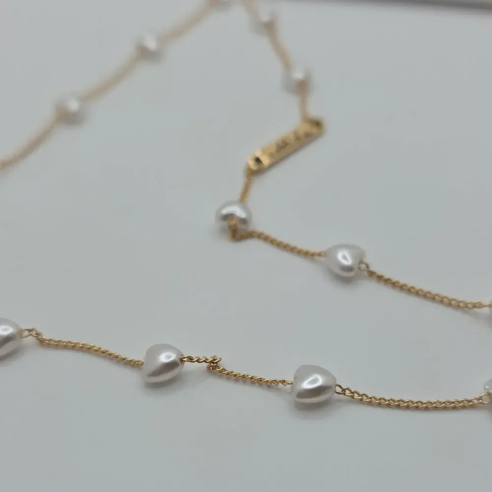 ettika Gold & White Eyewear Chain with Heart-Shaped Pearls Sunglasses Holder